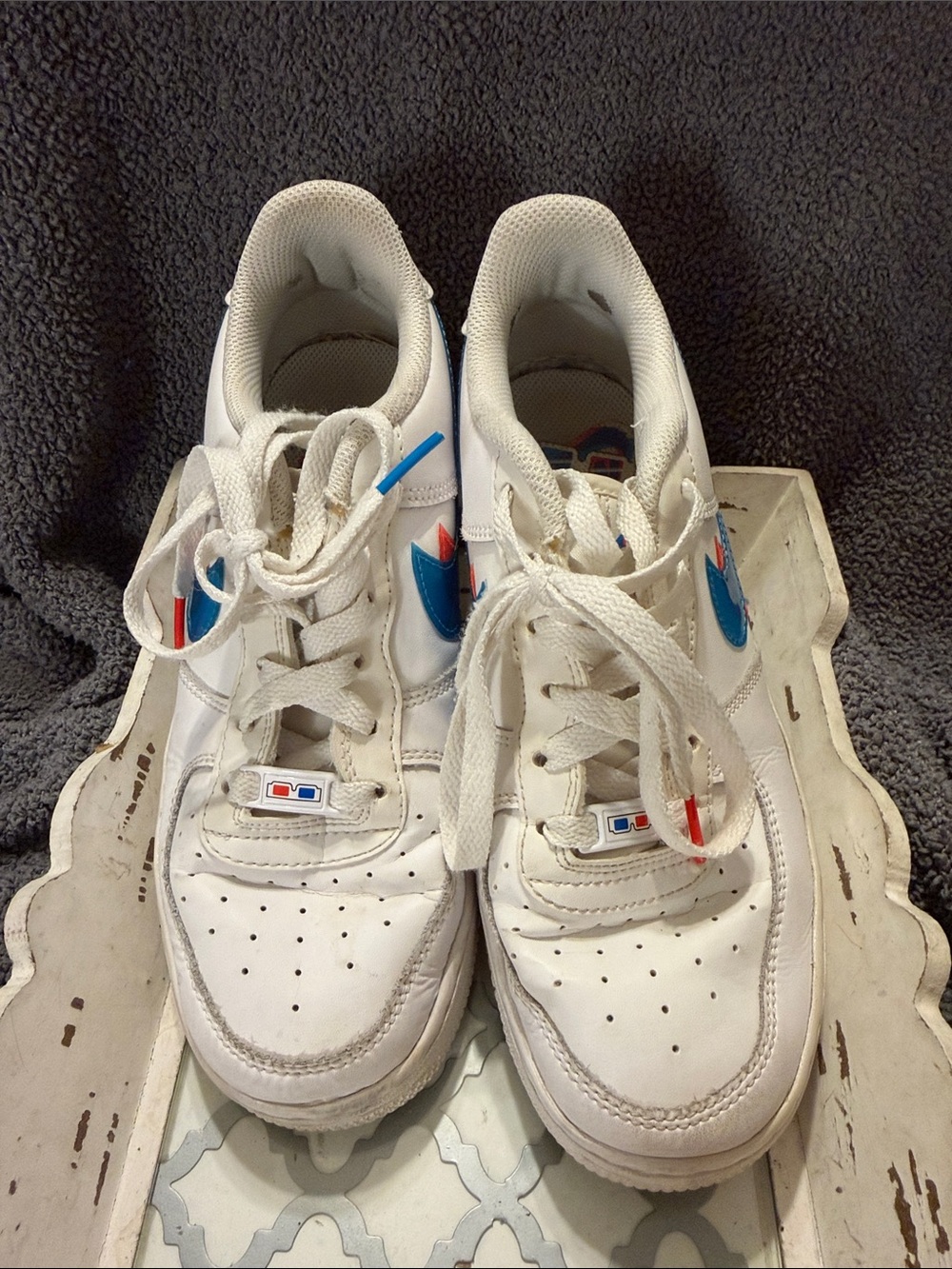 Nike Air Force’s 1  Kids White Sneakers with Blue and Red Accents 5.5y